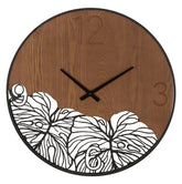 Reloj de pared redondo de madera metalizada con decoración de hojas