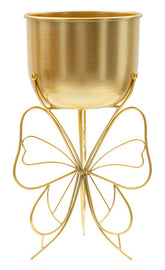 Florero de metal dorado con base de mariposa