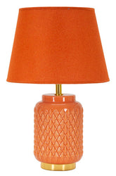 Lámpara de mesa naranja con pantalla de tela naranja