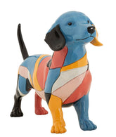 Escultura de perro salchicha animada de colores vivos