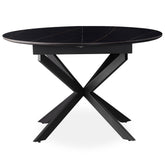 Mesa extensible Brigine de 160 cm con patas de araña y tapa de cerámica negra