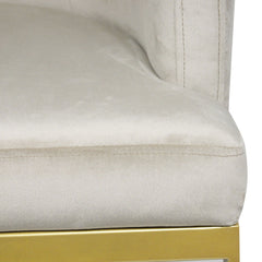 Chaise en velours taupe avec pieds dorés