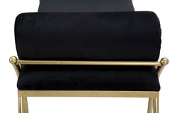 Banco de terciopelo negro y metal dorado