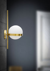 Aplique de metal dorado con esfera de cristal blanco y decoración de círculo dorado