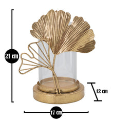 Porte-bougie en métal doré et verre avec design feuilles