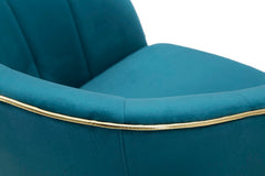 Sillón azul petróleo París con patas de madera negra y acabados dorados