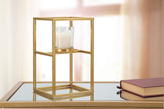 Bougeoir en métal doré avec verre carré