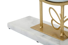 Espejo de mesa redondo con marco de metal dorado y base de mármol blanco con mariposa
