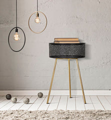 Mesa redonda Blacky de metal negro con patas doradas