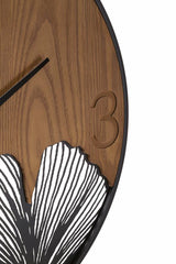 Reloj de pared redondo de metal y madera con esculturas de hojas
