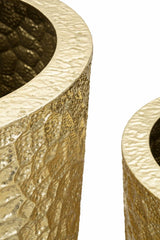 Juego de jarrones redondos de metal dorado con decoraciones en relieve