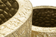 Juego de jarrones redondos de metal dorado con decoraciones en relieve