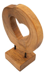 Escultura de teca con apertura de corazón