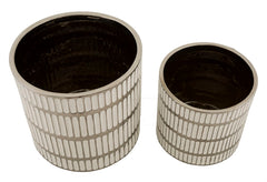Ensemble de deux vases en céramique décorés argenté
