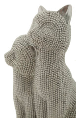 Estatua de pareja de gatos brillante