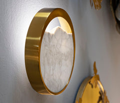 Aplique de pared redondo de metal dorado y cristal imitación mármol