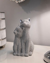 Estatua de pareja de gatos brillante