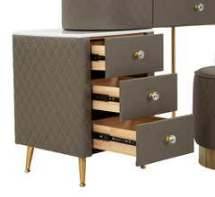 Tocador Sharon de polipiel acolchado con taburete de metal dorado