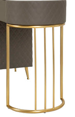 Tocador Sharon de polipiel acolchado con taburete de metal dorado