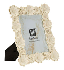 Frame with embossed flowers, 23.6 x 2.4 x 28.9 cm (internal dimensions 15 x 20 cm)