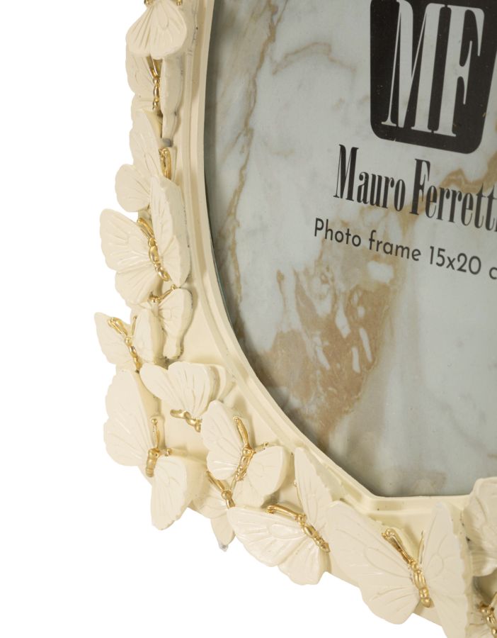 Frame with embossed butterflies, 20.3 x 2.3 x 25.8 cm (internal dimensions 15 x 20 cm)