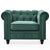 Fauteuil en velours vert capitonné