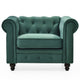 Fauteuil en velours vert capitonné