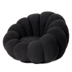 Sillón concha Basha de tela bouclé negra