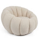 Sillón Bellina diseño concha tejido borreguito crema