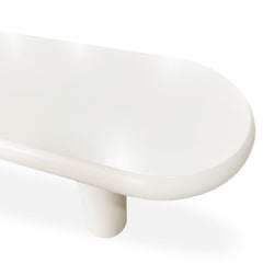 Table basse Clivo arrondie 160 cm avec pieds colonnes crème