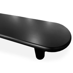 Mesa de centro Clivo redondeada de 160 cm con patas de columna negras