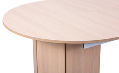 Mesa redonda extensible japandi de 310cm Cavelna con extensiones integradas de madera clara
